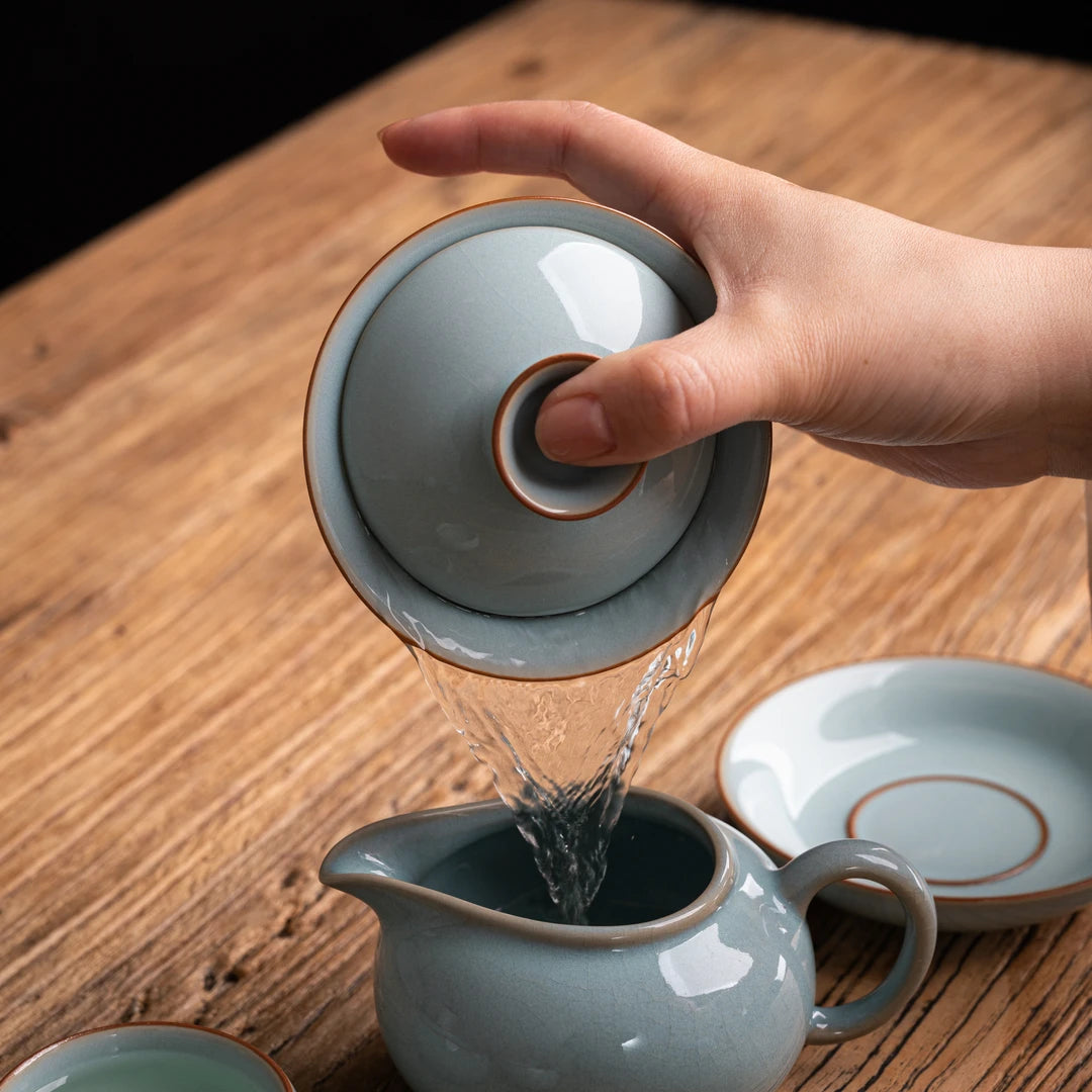 Chinese celadon teacup, jade-like finish for premium tea.