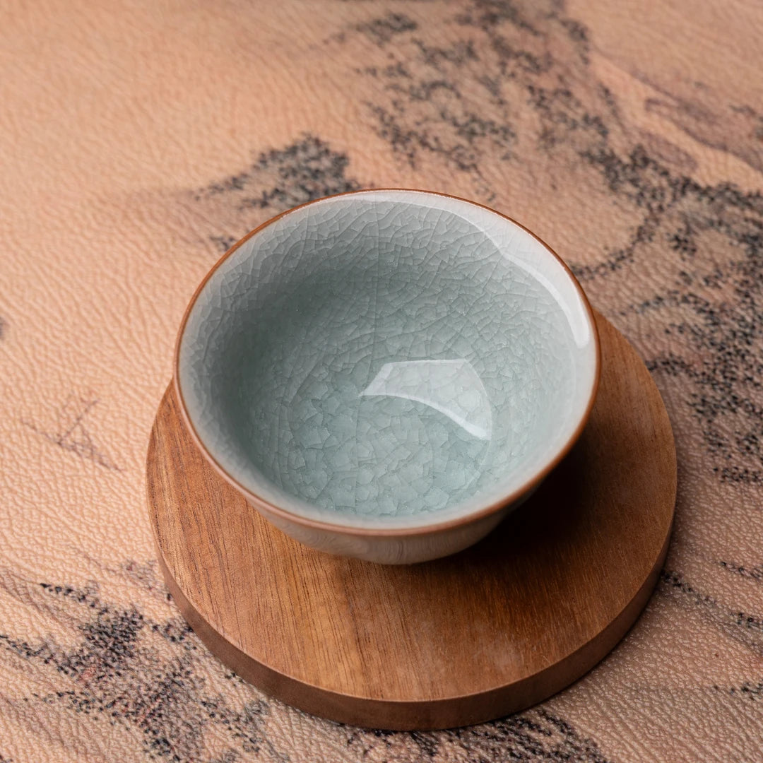Ice veins crackle glaze teacup that evolves with use