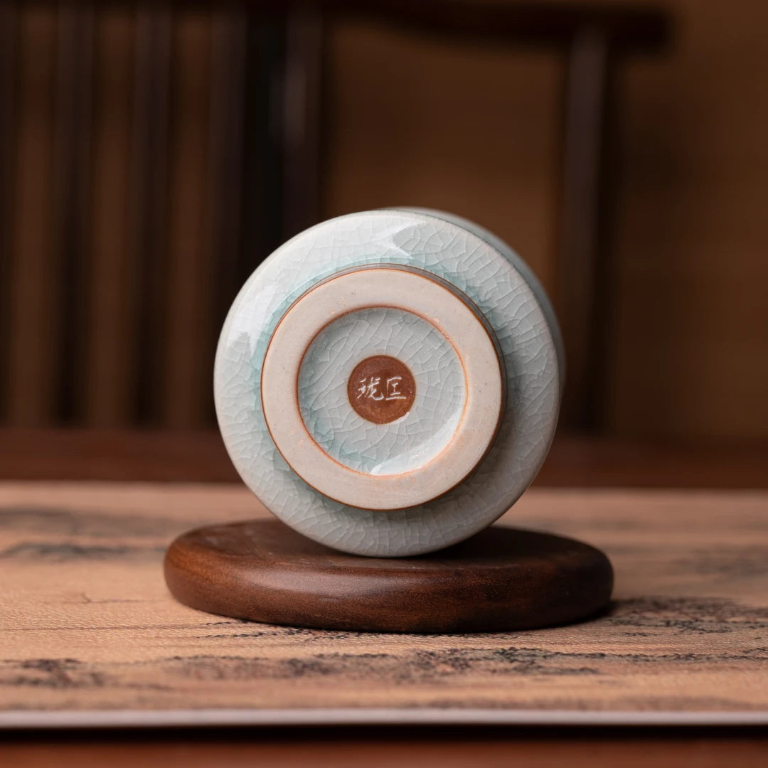 Traditional Chinese porcelain tea cup with fine frost crackle pattern