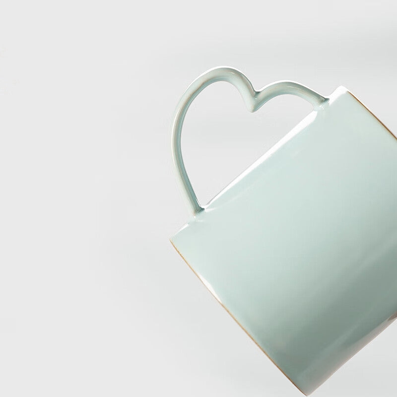 Artisan coffee cup with unique handle design